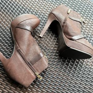 Brown bootie by BCBG size 9 4 inch heel with 2 buckles across.